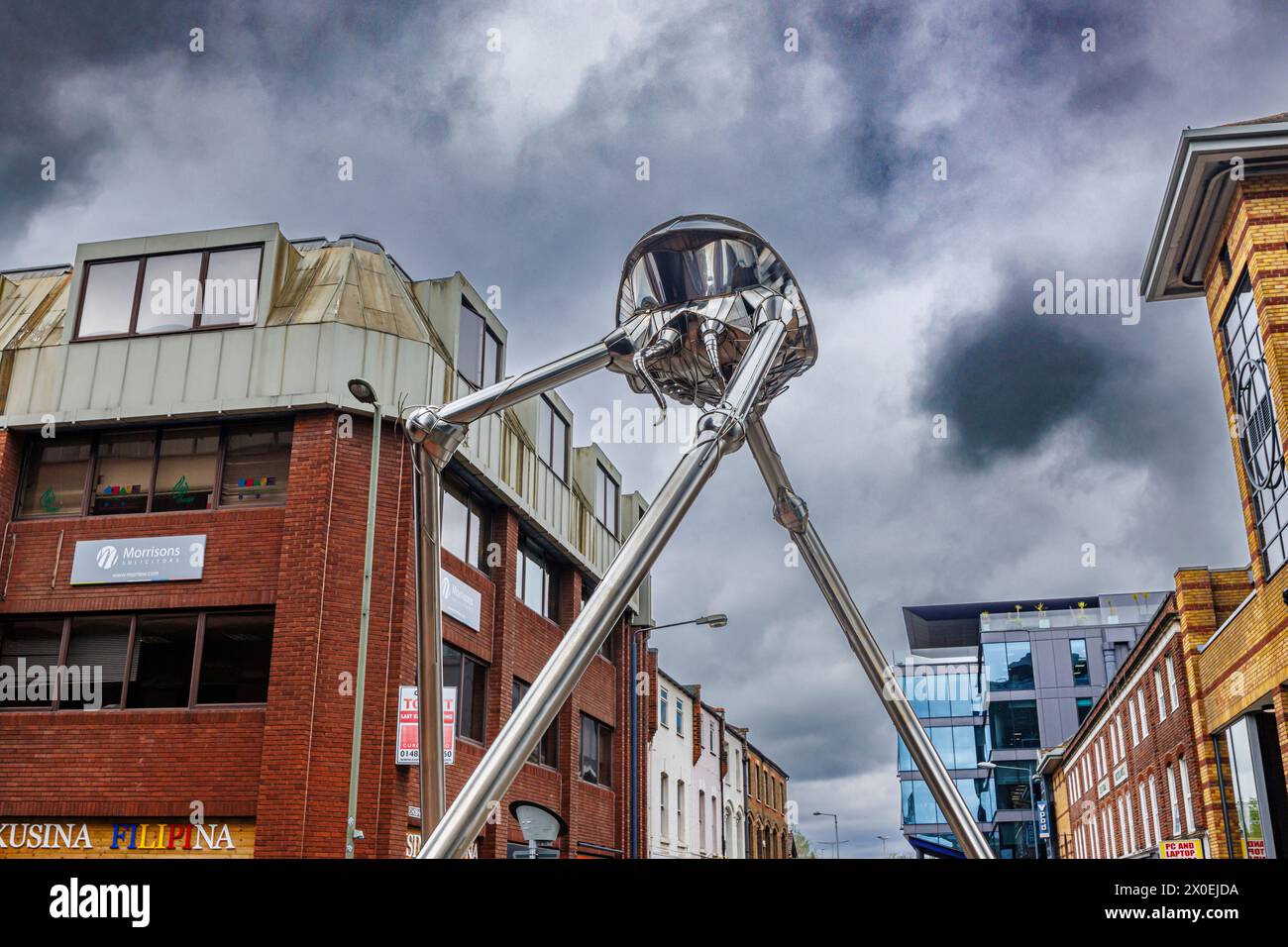 The Martian statue in the town centre of Woking, a town in Surrey, England, from the H G Wells novel 'War of the Worlds' set in nearby Horsell Common Stock Photo