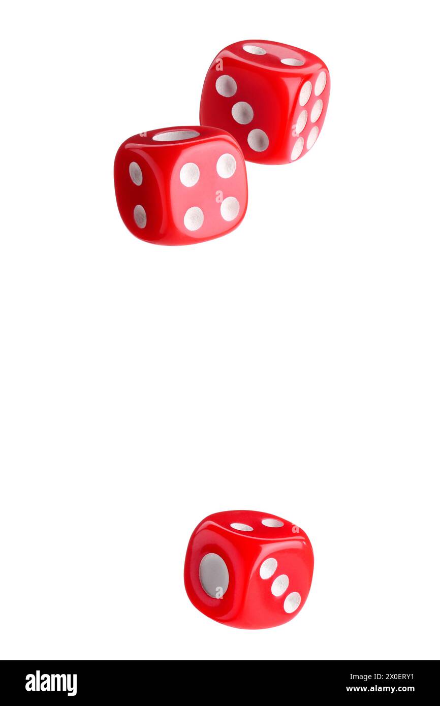 Three red dice in air on white background Stock Photo