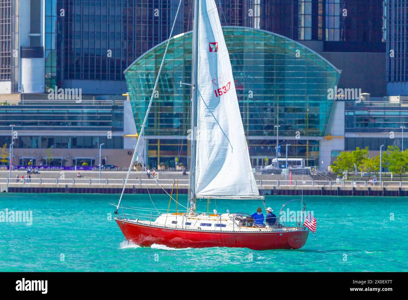 Sailing on the Detroit River at the Detroit International Riverfront and the entrance to the Renaissance Center, featuring GM world headquarters in De Stock Photo