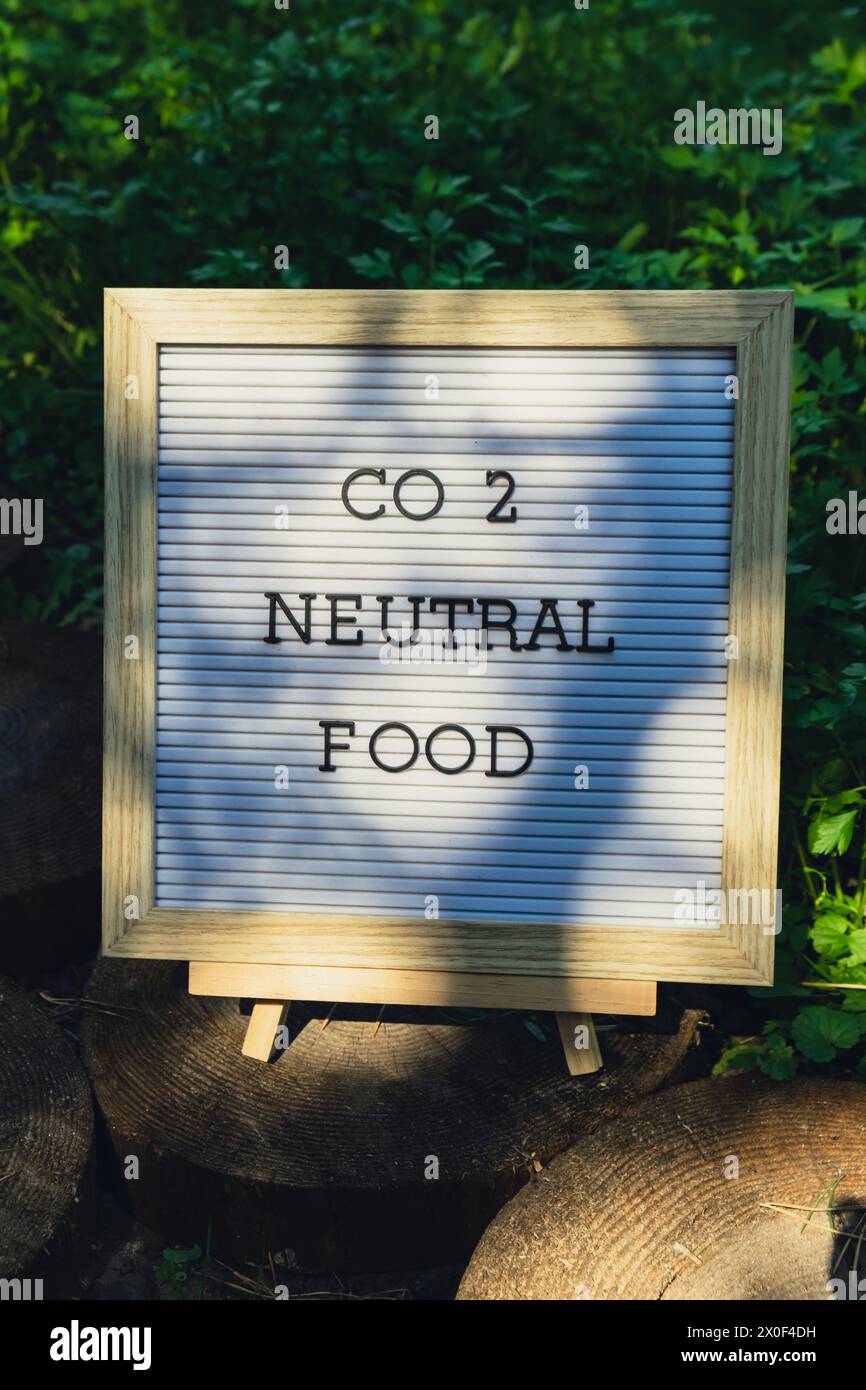 CO2 NEUTRAL FOOD message on background of fresh eco-friendly bio grown ...