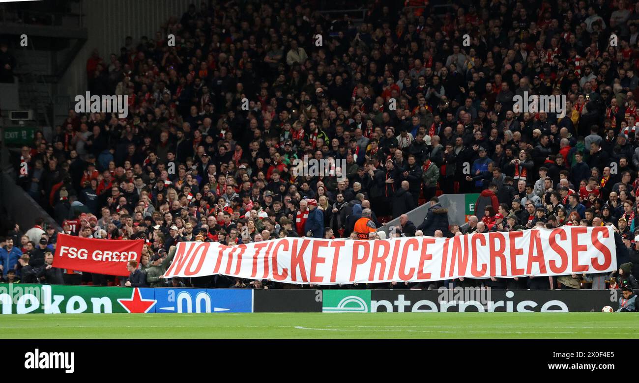 Anfield, Liverpool, Merseyside, UK. 11th Apr, 2024. Europa League, Quarter Final;, First Leg Football, Liverpool versus Atalanta; Liverpool fans on the Kop display banners protesting against the proposed increase in ticket prices by owners Fneway Sports Group Credit: Action Plus Sports/Alamy Live News Stock Photo
