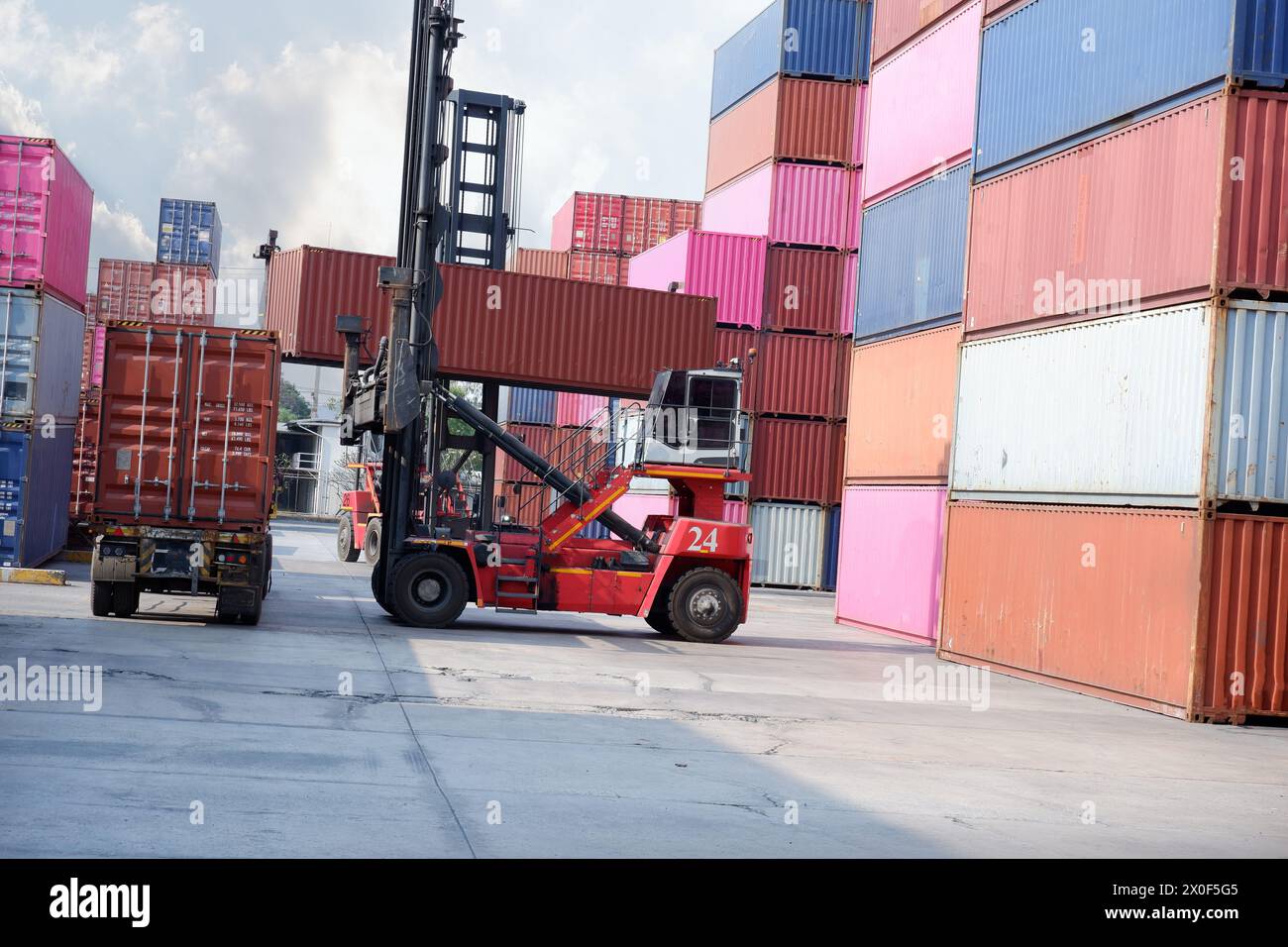 Forklift truck, cargo handling, container boxes in logistics shipping yard Stock Photo