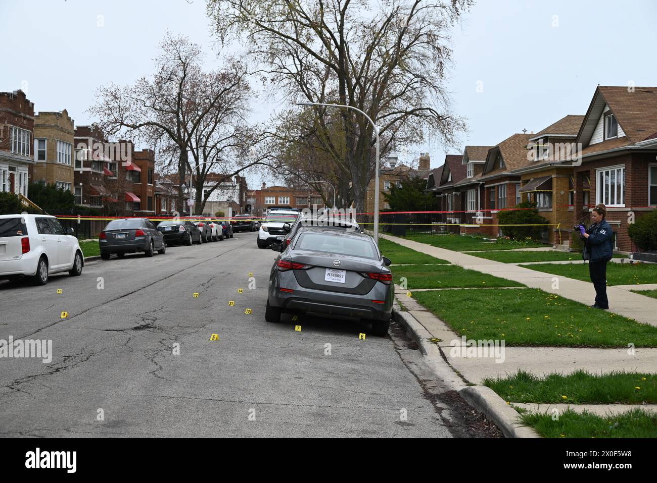 Shell casings discovered at the crime scene and marked by several ...