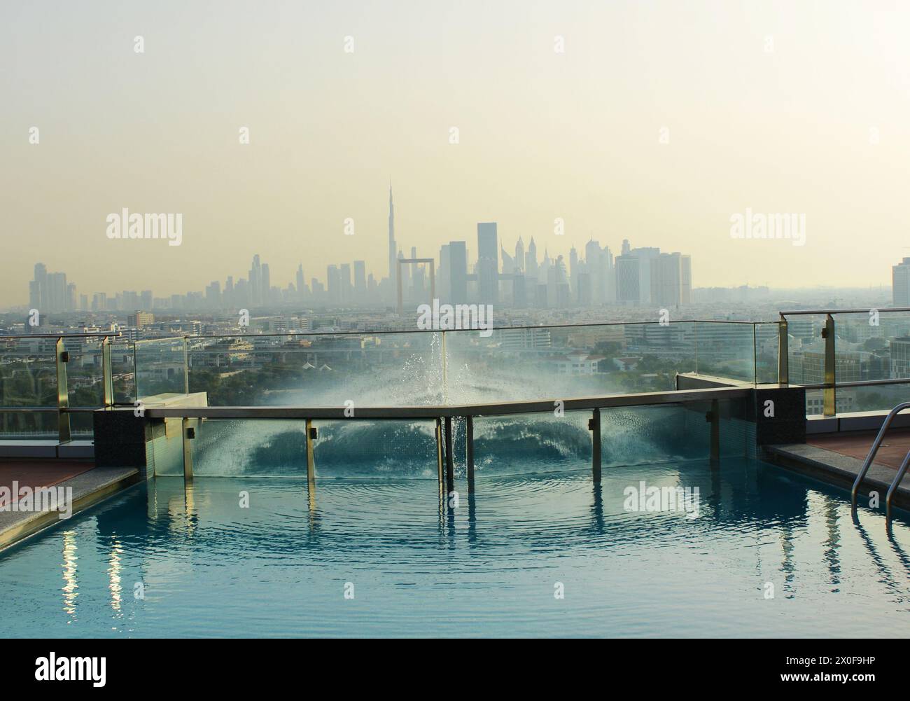 A view of the modern skyline of Dubai from the rooftop infinity pool at