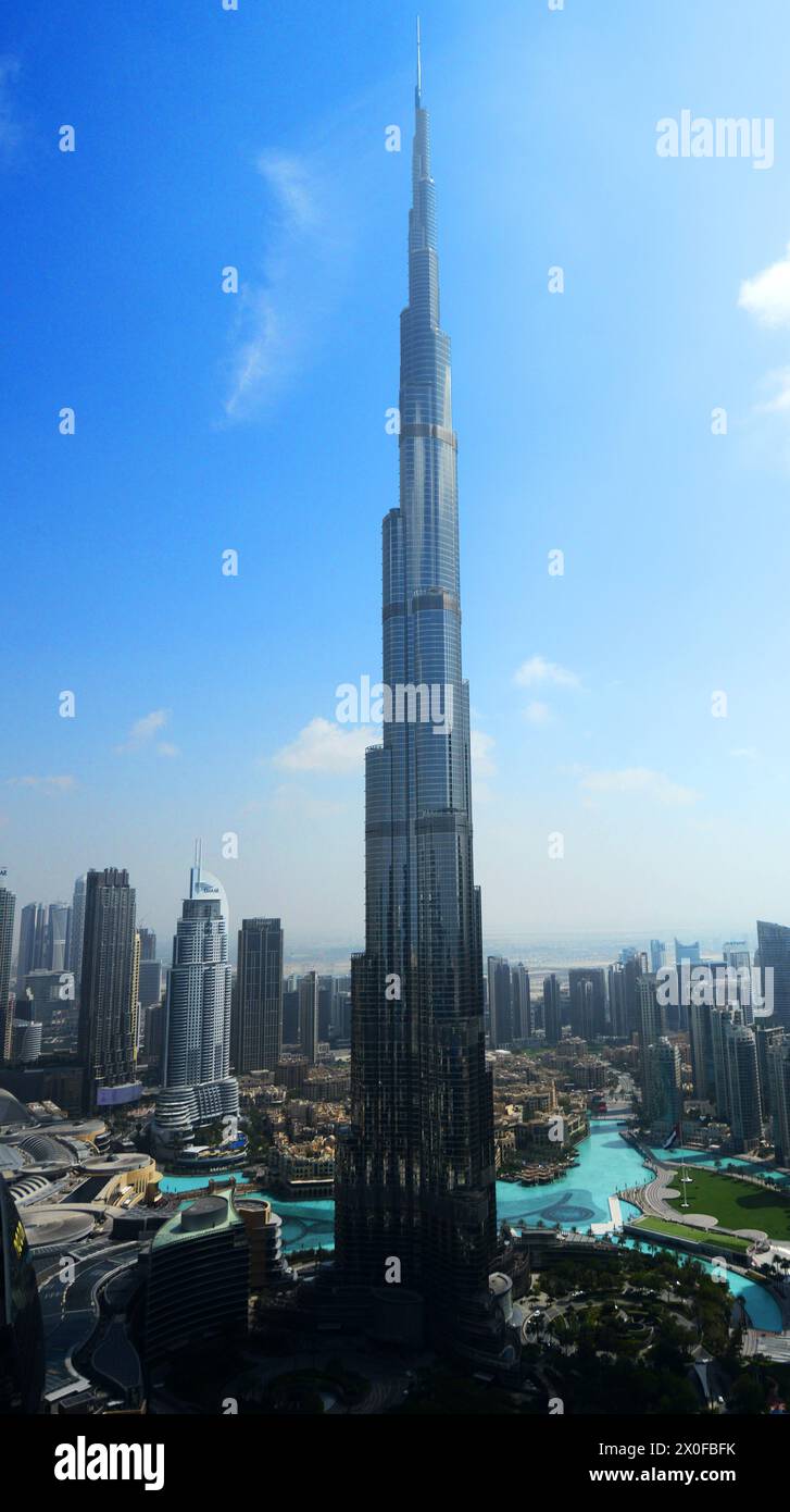 The Burj Khalifa tower with the Dubai Mall and other skyscrapers around it in Dubai, UAE. Stock Photo