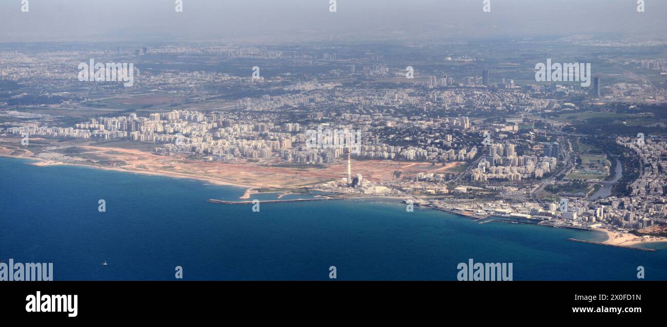 Aerial view of northern Tel-Aviv with the Reading park and powerplant and the previous Sde Dov airport land designated for new projects. Stock Photo