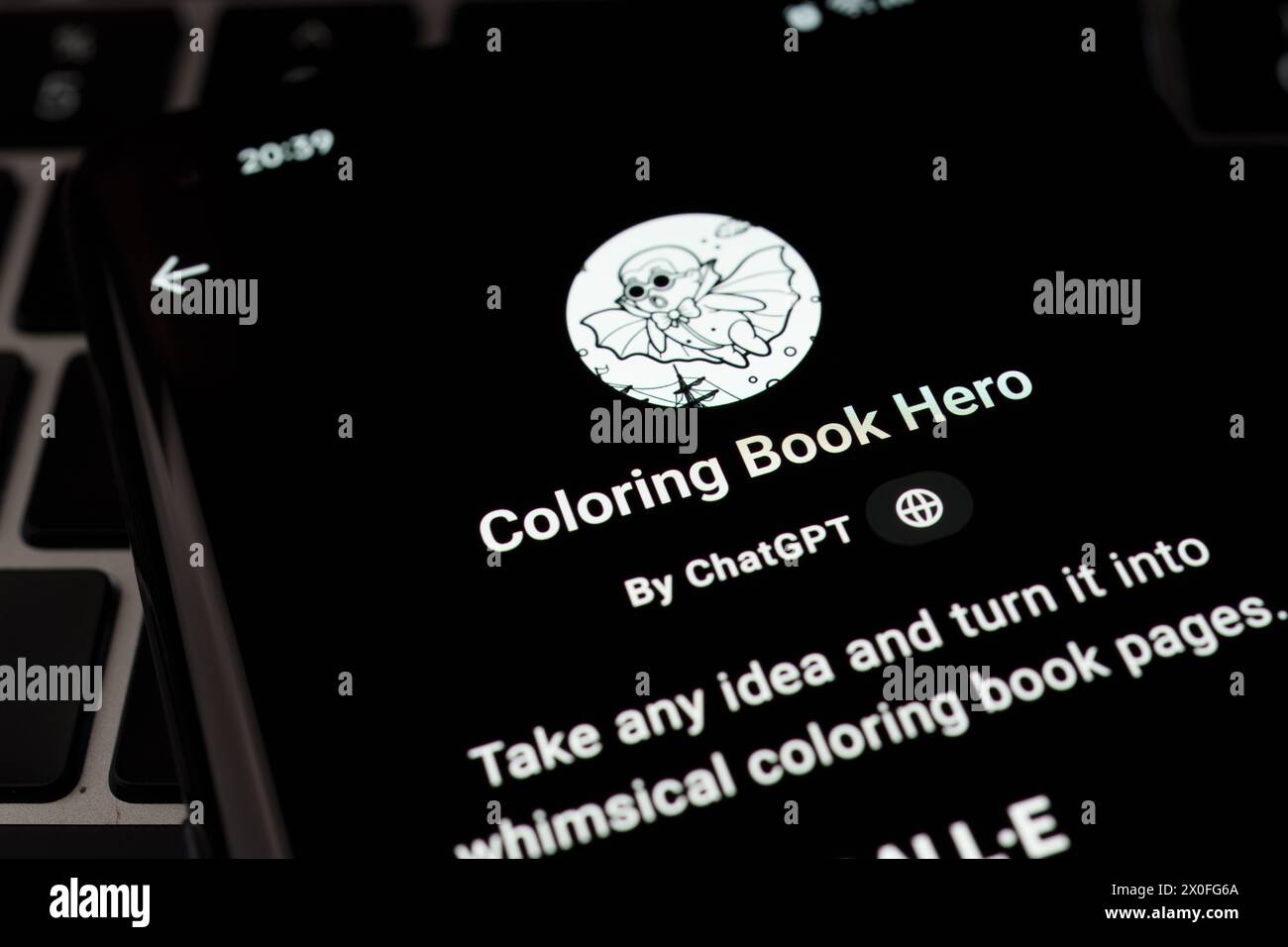 COLORING BOOK HERO custom GPT seen in GPT Store on the screen of smartphone placed on laptop keyboad. Stafford, United Kingdom, April 8, 2024 Stock Photo
