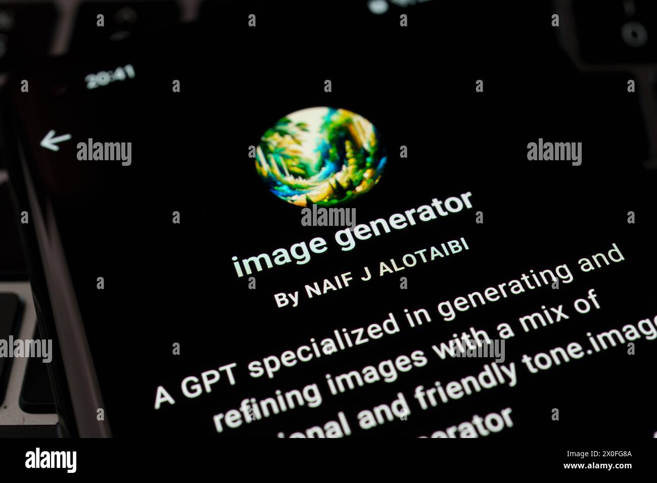 IMAGE GENERATOR custom GPT seen in GPT Store on the screen of smartphone placed on laptop keyboad. Stafford, United Kingdom, April 8, 2024 Stock Photo