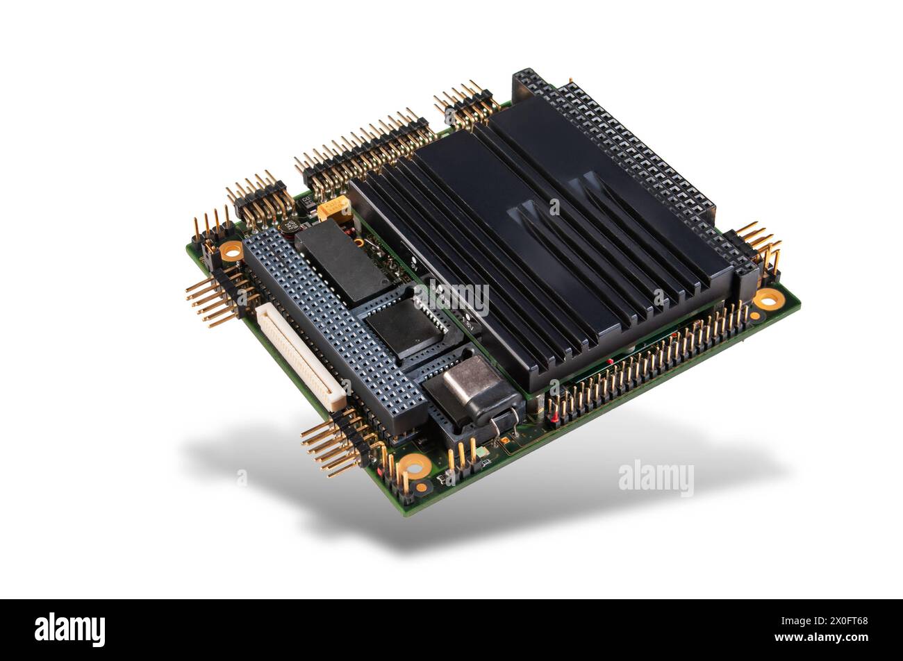 Close-up of an embedded PC/104+ CPU module with integrated chips and connectors, isolated on a white background. Stock Photo