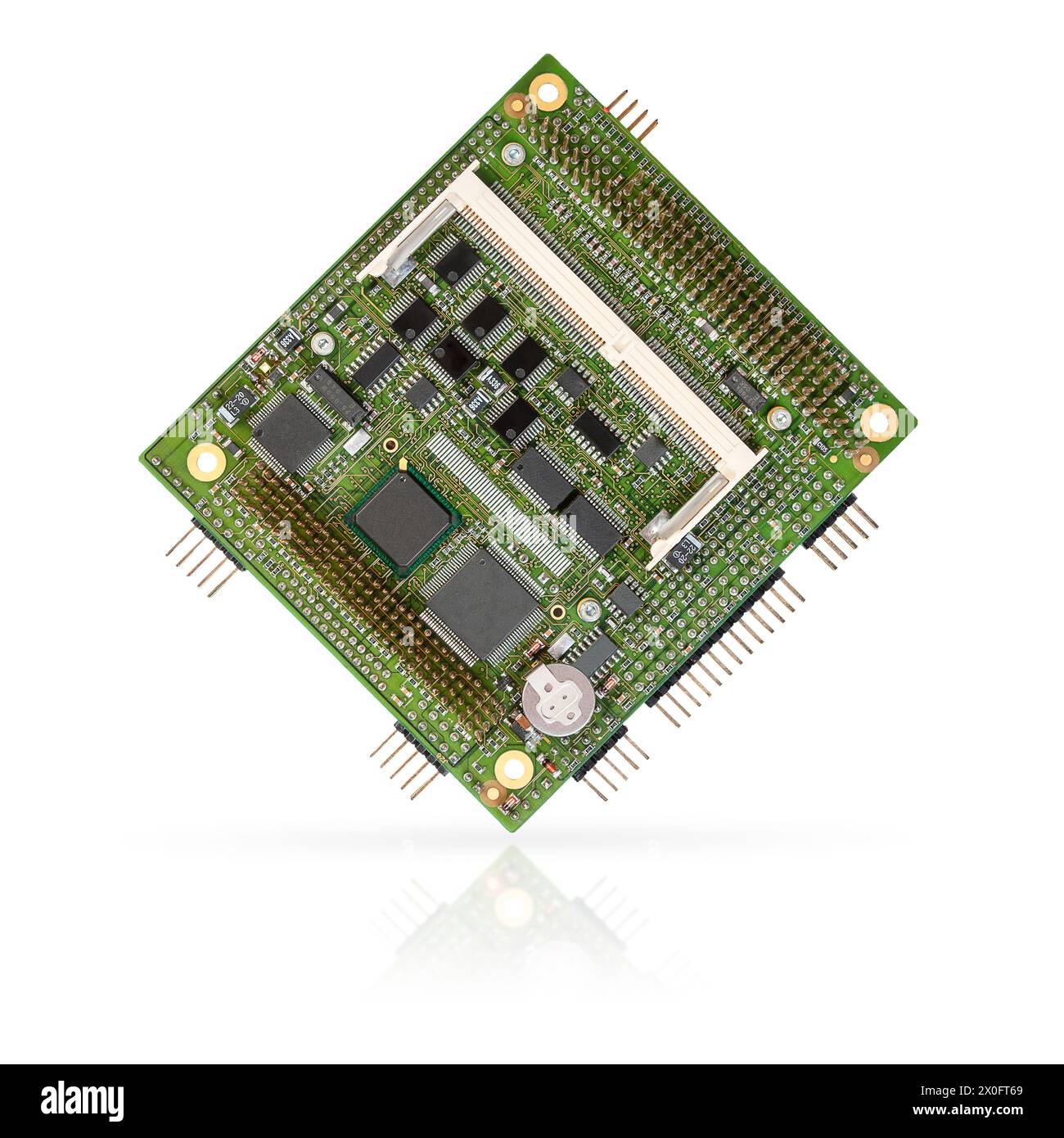 Close-up of an embedded PC/104+ CPU module with integrated chips and connectors, isolated on a white background. Stock Photo