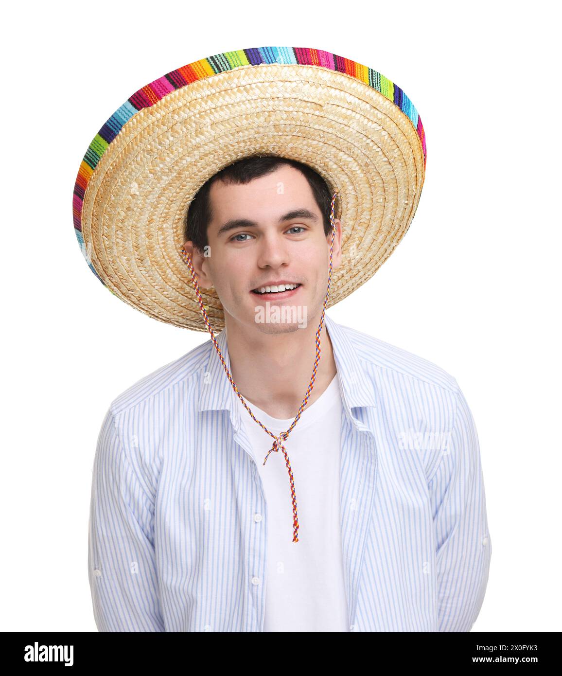 Young man in Mexican sombrero hat on white background Stock Photo