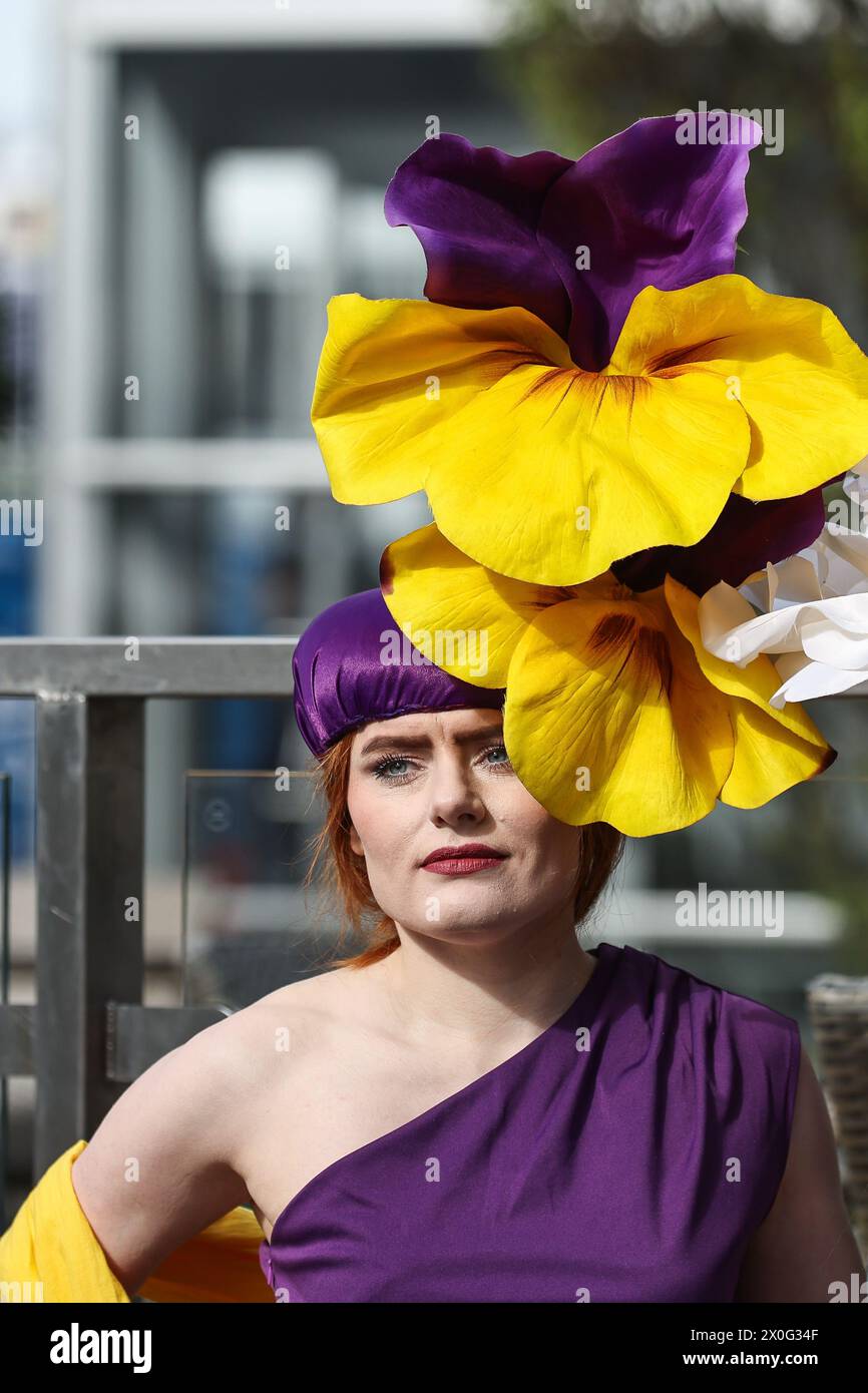 Racegoers arrive on ladies day at during the The Randox Grand National 2024 Ladies Day at Aintree Racecourse, Liverpool, United Kingdom, 12th April 2024  (Photo by Mark Cosgrove/News Images) in ,  on 4/12/2024. (Photo by Mark Cosgrove/News Images/Sipa USA) Stock Photo