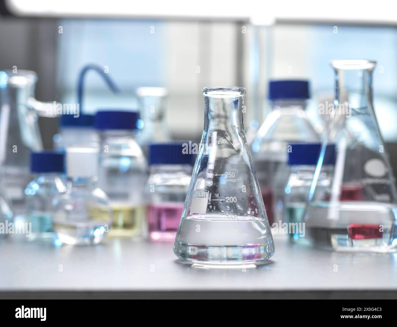 Laboratory glassware being used to develop a chemical formula Stock ...