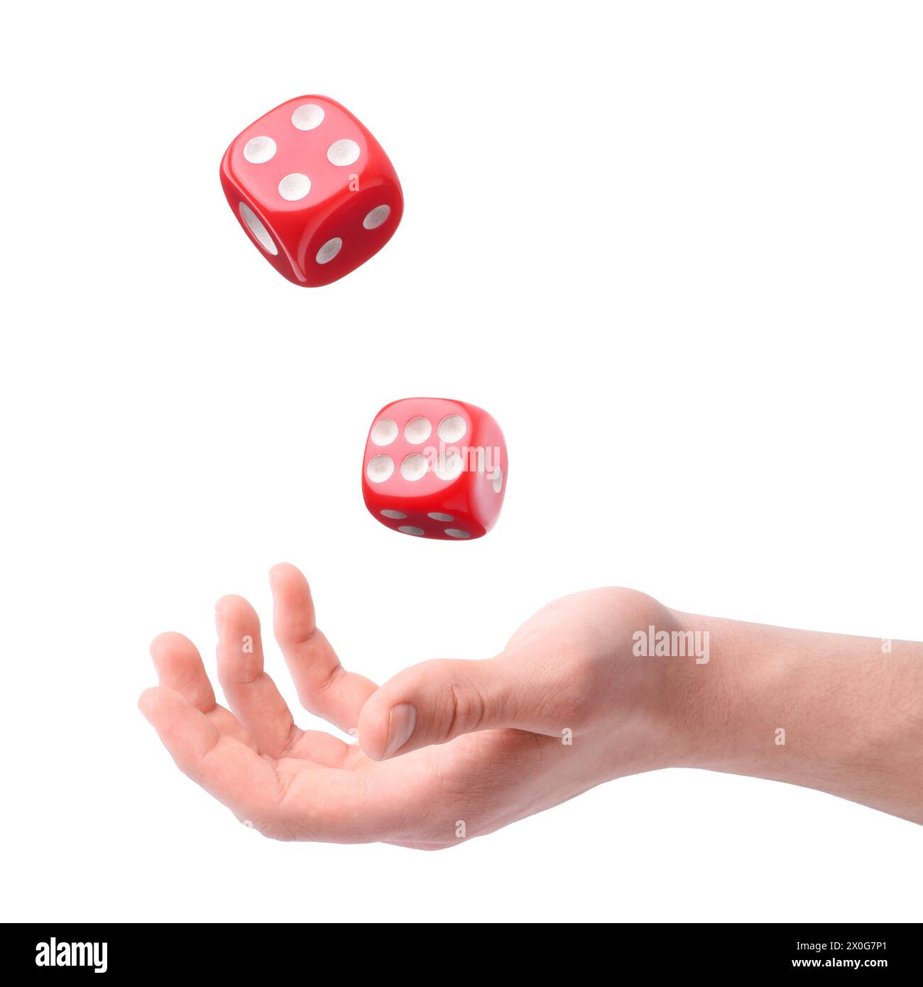 Man throwing red dice on white background, closeup Stock Photo