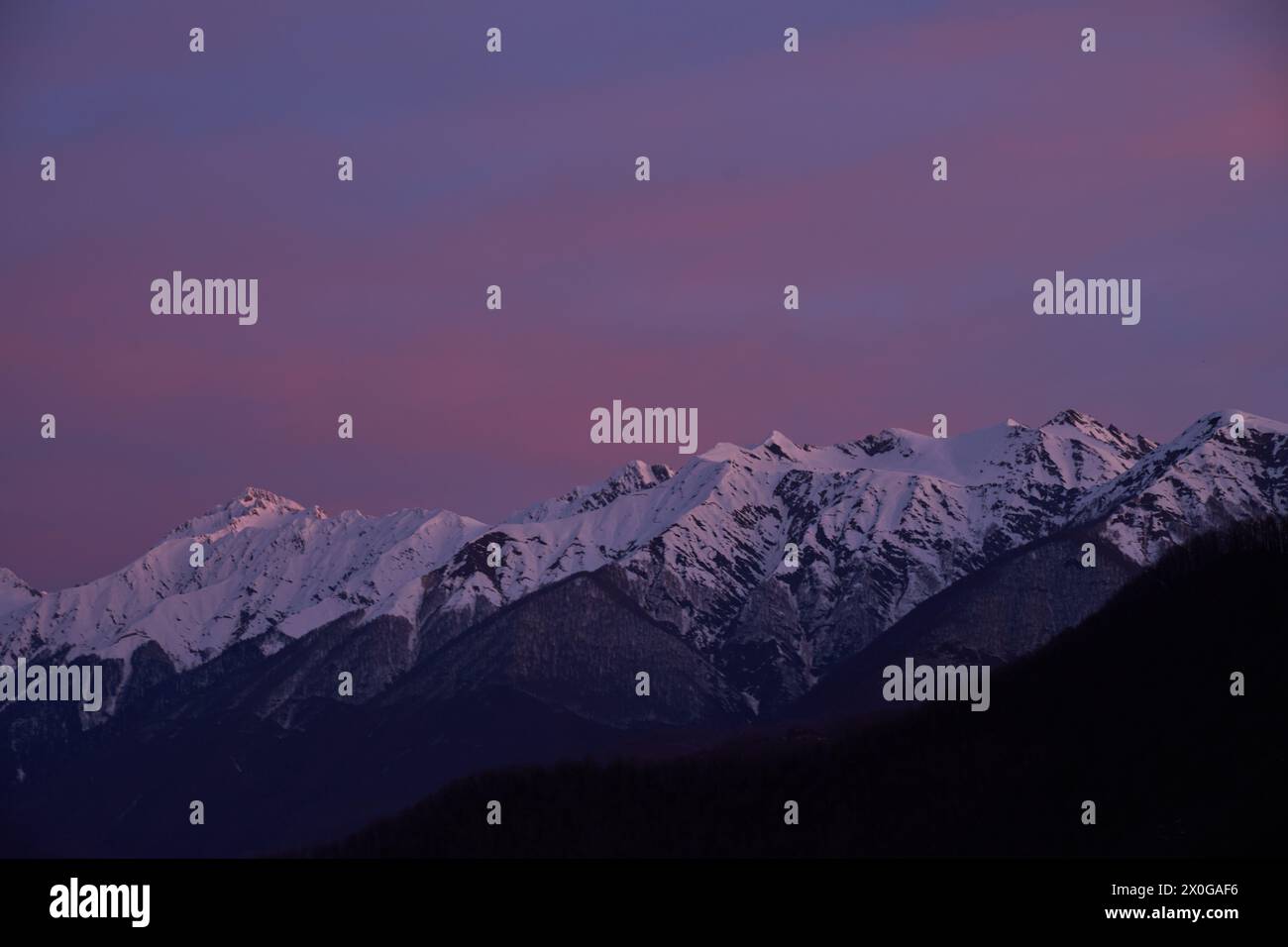 Snow capped mountains silhouette hi-res stock photography and images ...