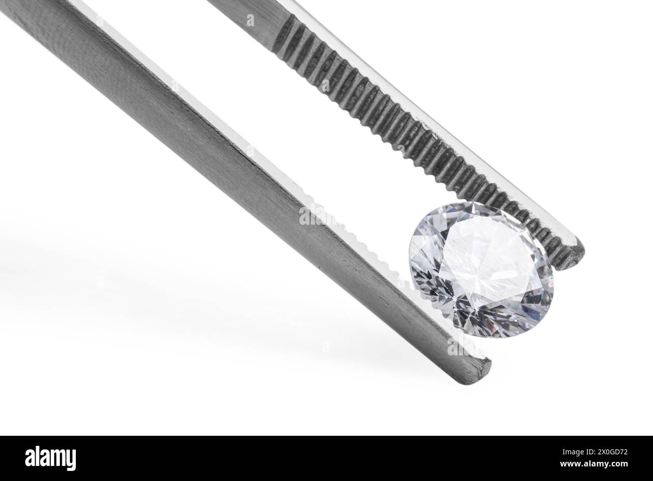 Tweezers with beautiful shiny diamond isolated on white Stock Photo - Alamy