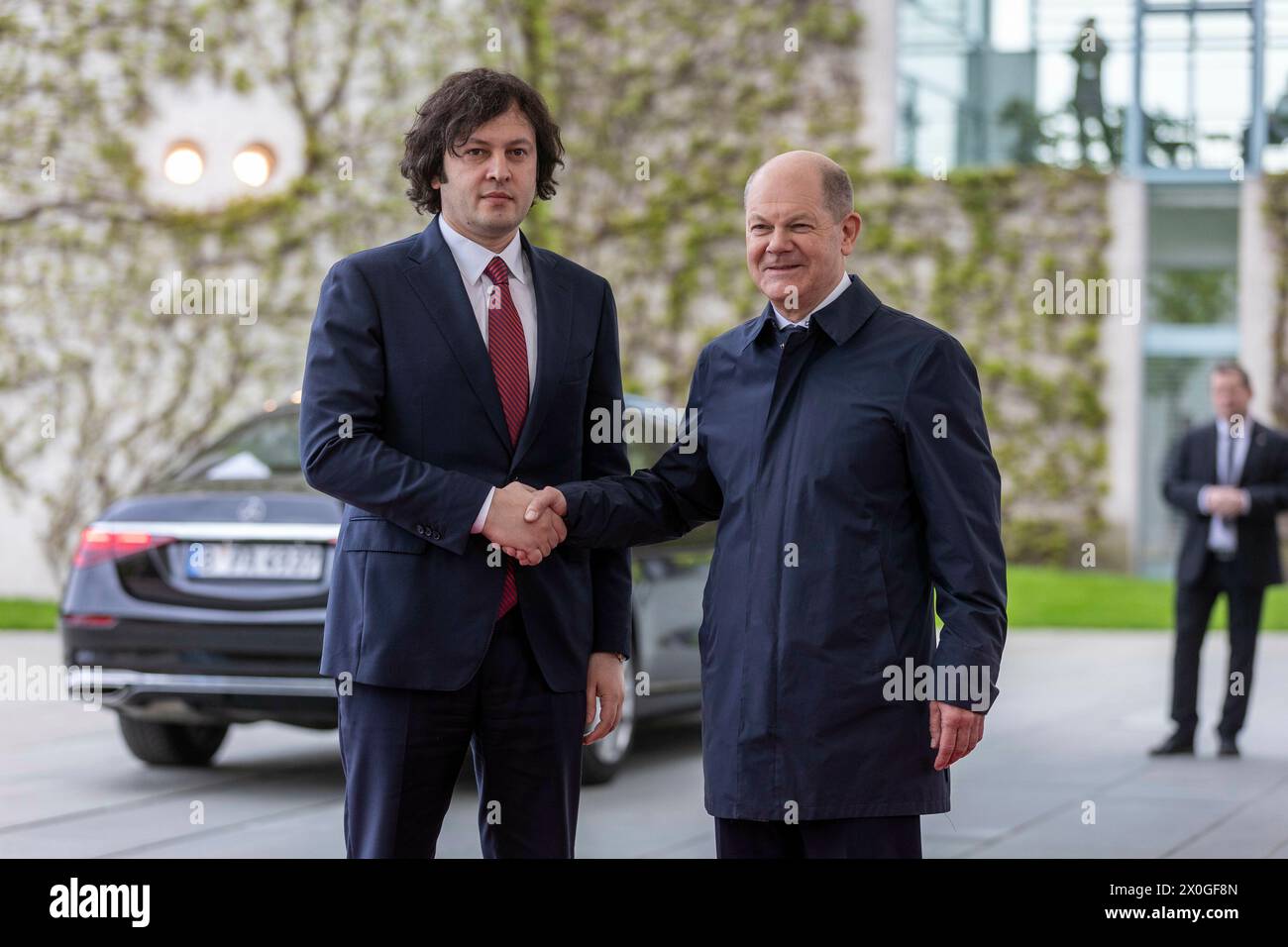 Berlin, Deutschland. 12th Apr, 2024. Federal Chancellor Olaf Scholz (SPD) welcomes Irakli Kobachidze, Prime Minister of Georgia, at the Federal Chancellery with military honors in Berlin, April 12, 2024. Credit: dpa/Alamy Live News Stock Photo