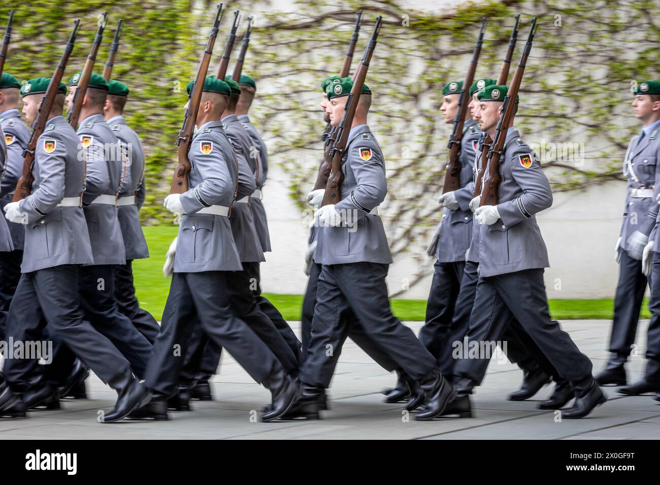 Berlin, Deutschland. 12th Apr, 2024. Soldiers from the Bundeswehr Guard Battalion, photographed during a reception with military honors in the courtyard of the Federal Chancellery in Berlin, April 12, 2024. Credit: dpa/Alamy Live News Stock Photo
