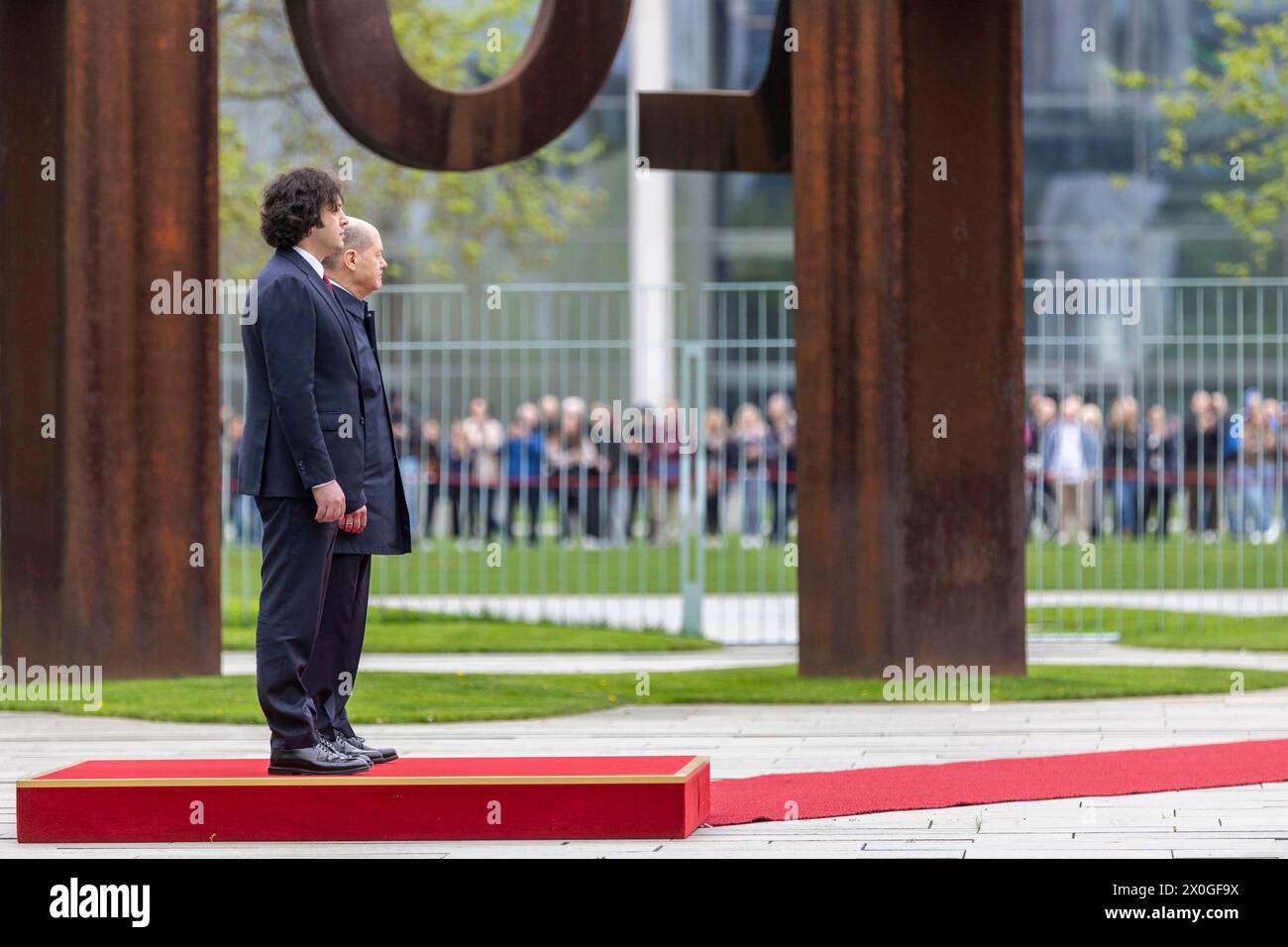 Berlin, Deutschland. 12th Apr, 2024. Federal Chancellor Olaf Scholz (SPD) welcomes Irakli Kobachidze, Prime Minister of Georgia, at the Federal Chancellery with military honors in Berlin, April 12, 2024. Credit: dpa/Alamy Live News Stock Photo