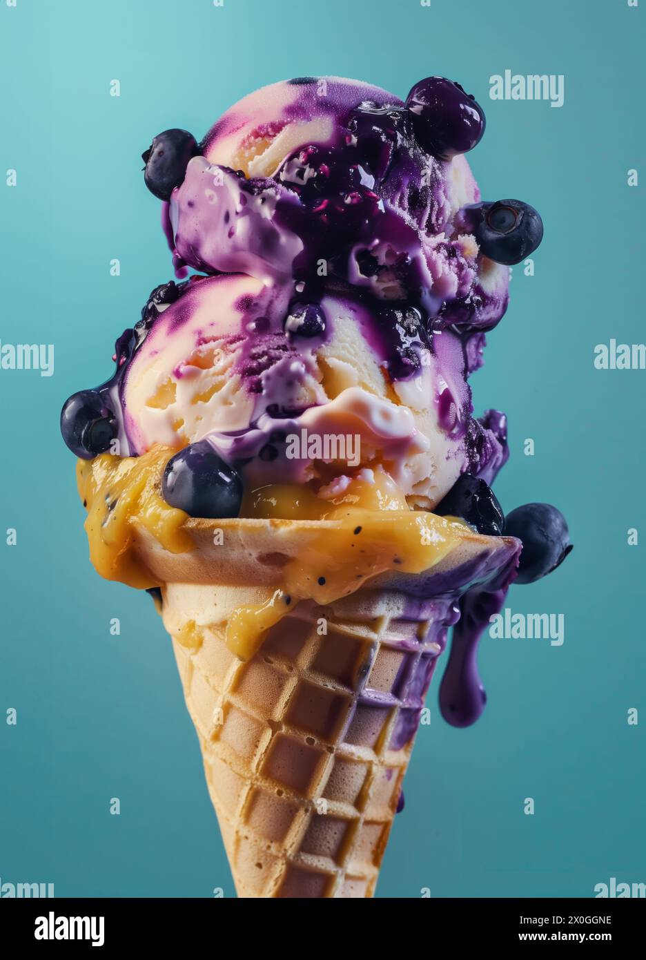 Two scoops of Blueberry ice cream on top ice cream cone Stock Photo