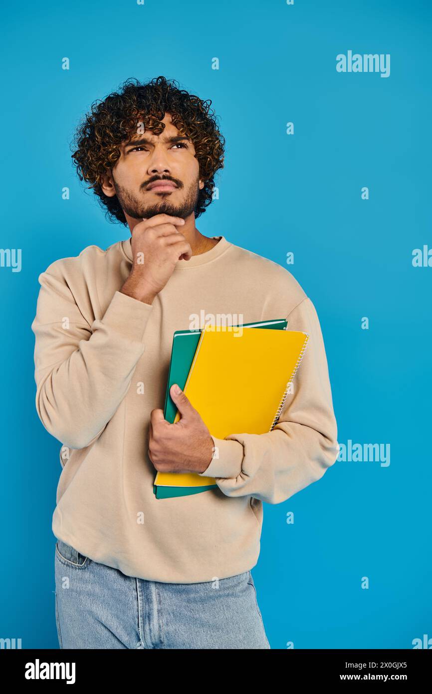 Indian man standing confidently hi-res stock photography and images - Alamy