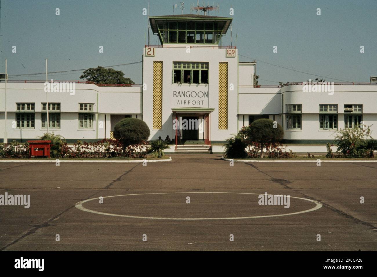 The main building of Rangoon airport with control tower. [automated ...