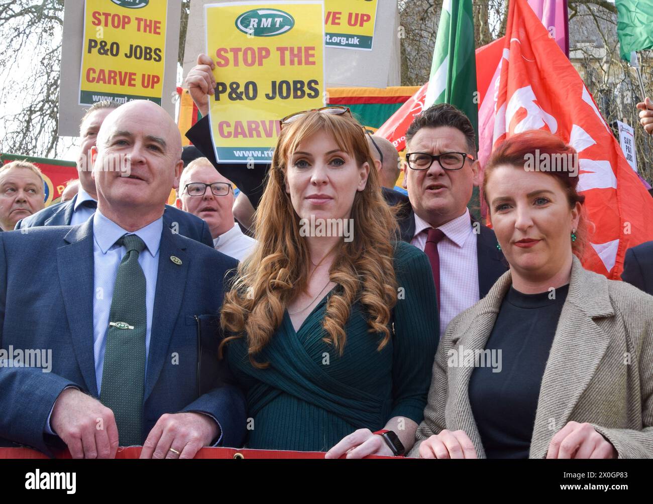 London, UK. 21st March 2022. Labour deputy leader Angela Rayner, Shadow Secretary of State for Transport and Labour MP Louise Haigh, and secretary general of RMT Mick Lynch join the protesters outside Parliament. P&O Ferries staff and RMT Union members marched from the headquarters of DP World, the company which owns P&O, to Parliament, after 800 UK staff were fired and replaced by agency workers. Credit: Vuk Valcic / Alamy Stock Photo