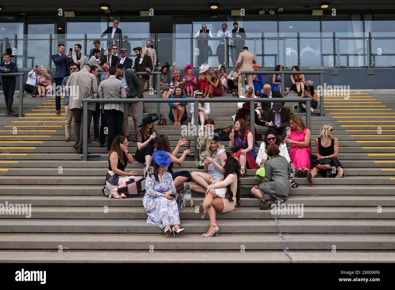 Racegoers during the The Randox Grand National 2024 Ladies Day at Aintree Racecourse, Liverpool, United Kingdom. 12th Apr, 2024. (Photo by Mark Cosgrove/News Images) in, on 4/12/2024. (Photo by Mark Cosgrove/News Images/Sipa USA) Credit: Sipa USA/Alamy Live News Stock Photo