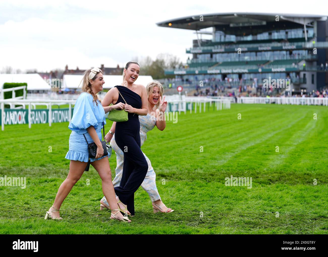 Randox Races Racegoers crossing the track on day two of the 2024 Randox Grand ...
