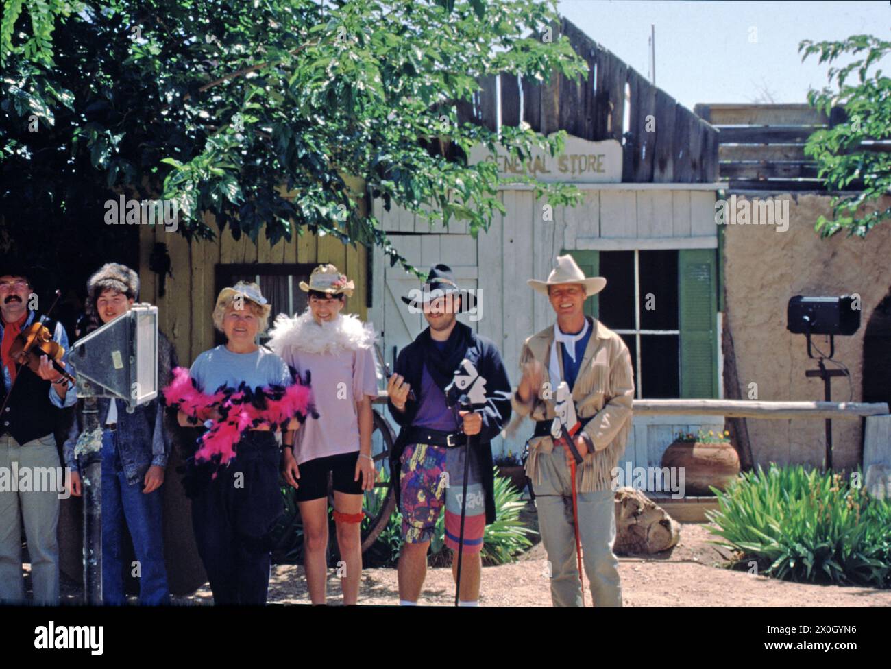 Tourists in cowboy clothing, Western Store, Kanab, Utah, USA [automated translation] Stock Photo