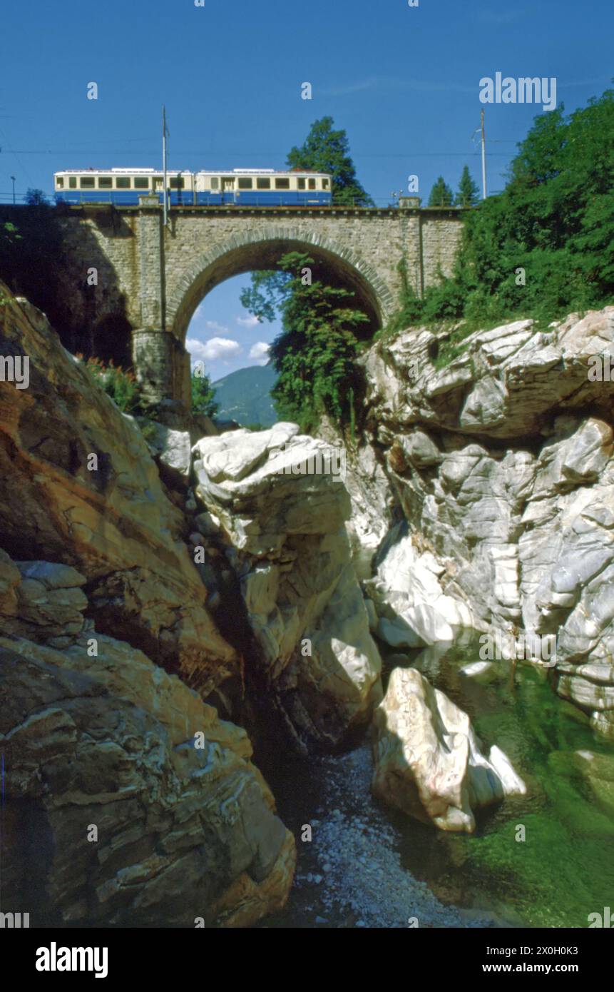 The Centovalli Railway on a viaduct near Pontebrolla in Ticino, Switzerland [automated translation] Stock Photo