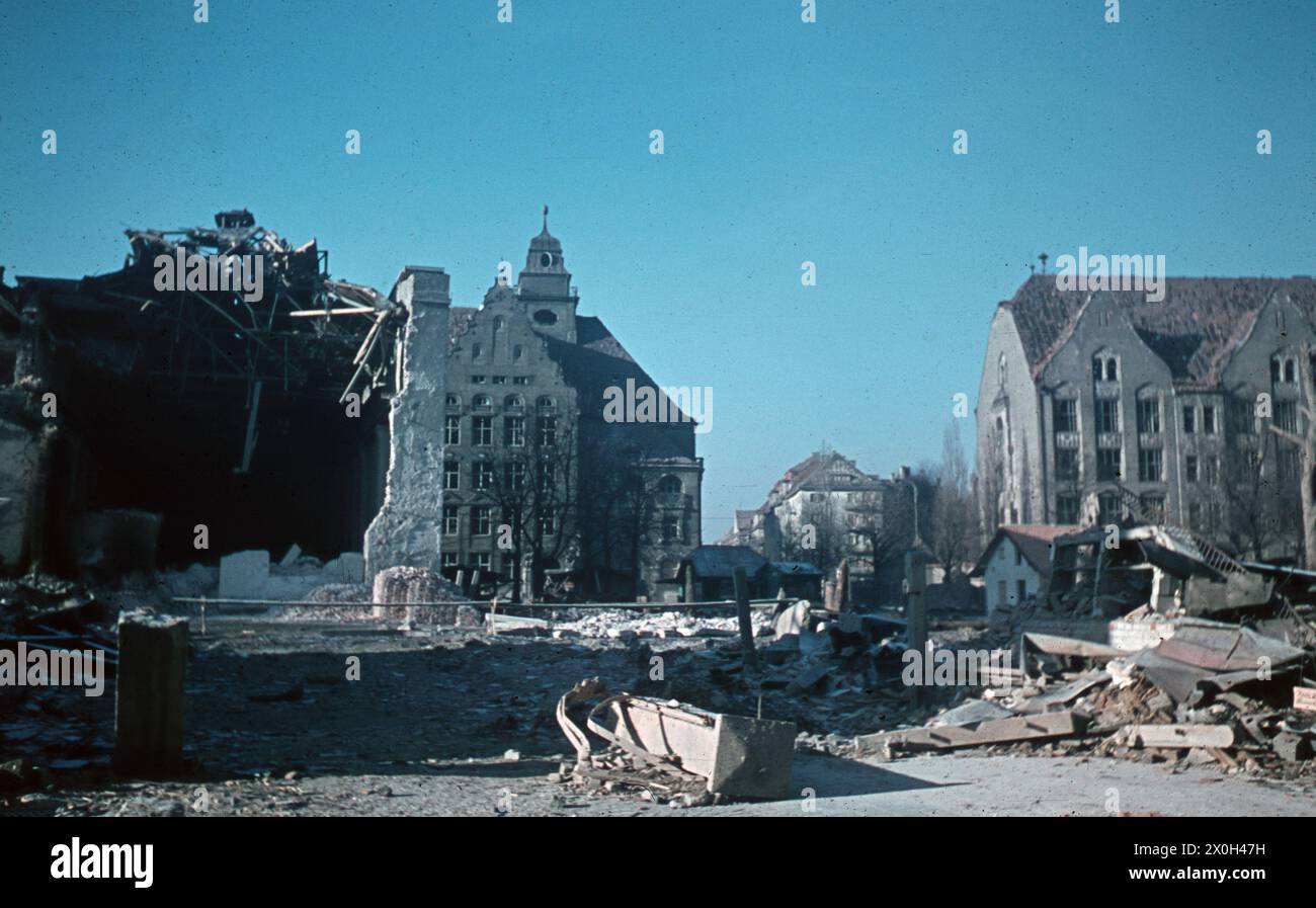 The Elisabethplatz in Munich, that was destroyed by the Second World War. In the background is the facade of the Gisela Gymnasium (undated picture). Stock Photo