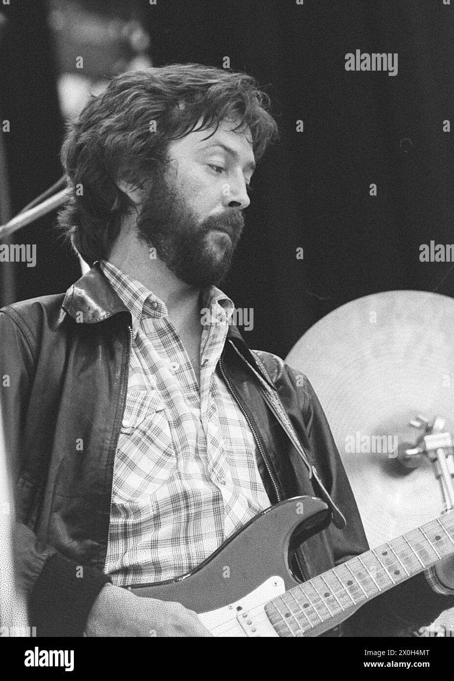 Eric Clapton performing at a festival on the Zeppelin Field in ...