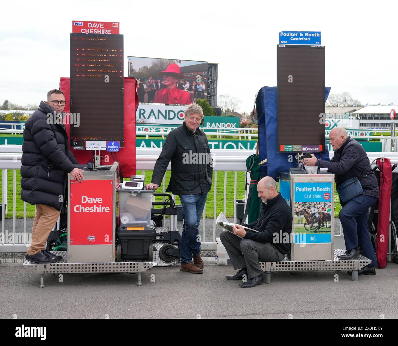 Aintree Racecourse, Aintree, Merseyside, England. 12th April 2024.  2024 Grand National Festival Day 2;  Bookmakers prepare their pitches as they wait for the punters during Ladies Day, day 2 of the festival.Photo credit: Stephen Hearn/Action Plus Sports Images/ Alamy Live News Stock Photo
