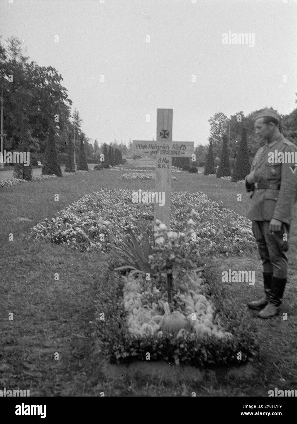 Soldier's grave in a park. [automated translation] Stock Photo