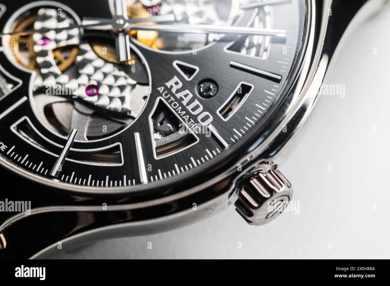 Lengnau, Switzerland - November 11, 2021: Close up photo of luxury Swiss made mechanical wrist watch with black clock face and body made of ceramics. Stock Photo