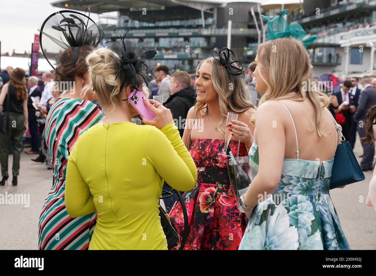 Racegoers on day two of the 2024 Randox Grand National Festival at ...