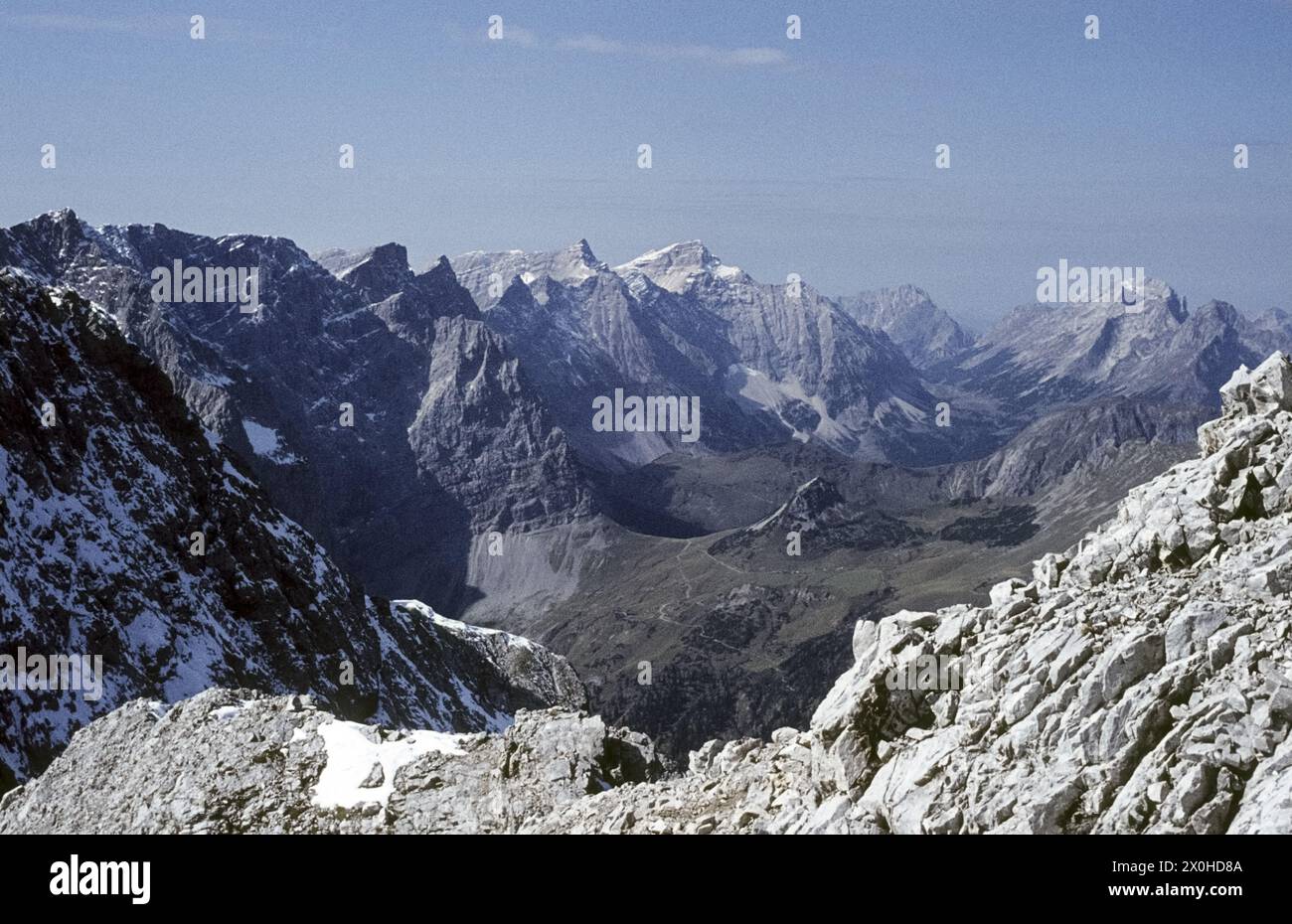 Autumnal view of the Karwendel valley and the Dreizinkenspitze and Birkkarspitze peaks [automated translation] Stock Photo