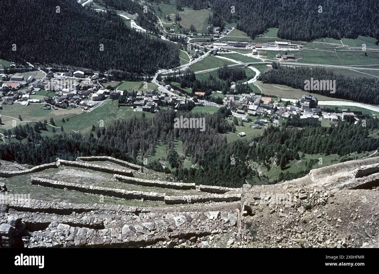 On the Ibex Trail on the south side of the Schafberg near Pontresina. View into the valley. Avalanche barriers made of stones in front [automated translation] Stock Photo