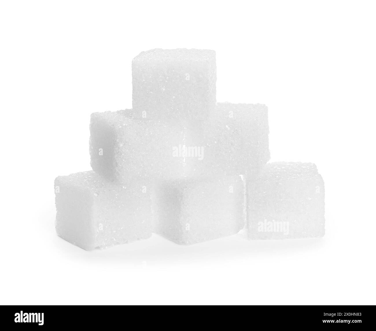 Many refined sugar cubes isolated on white Stock Photo