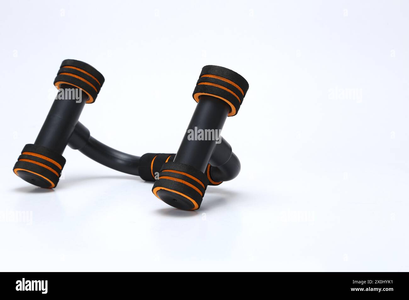 black pushup bar stand isolated on white background Stock Photo - Alamy
