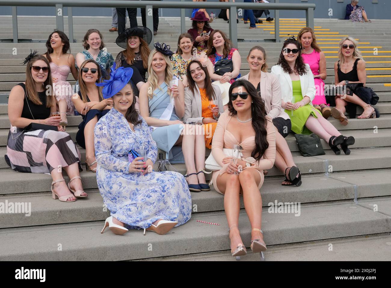 12th April 2024; Aintree Racecourse, Aintree, Merseyside, England: 2024 Grand National Festival Day 2; A groups of ladies enjoy their champagne during Ladies Day, day 2 of the festival Stock Photo