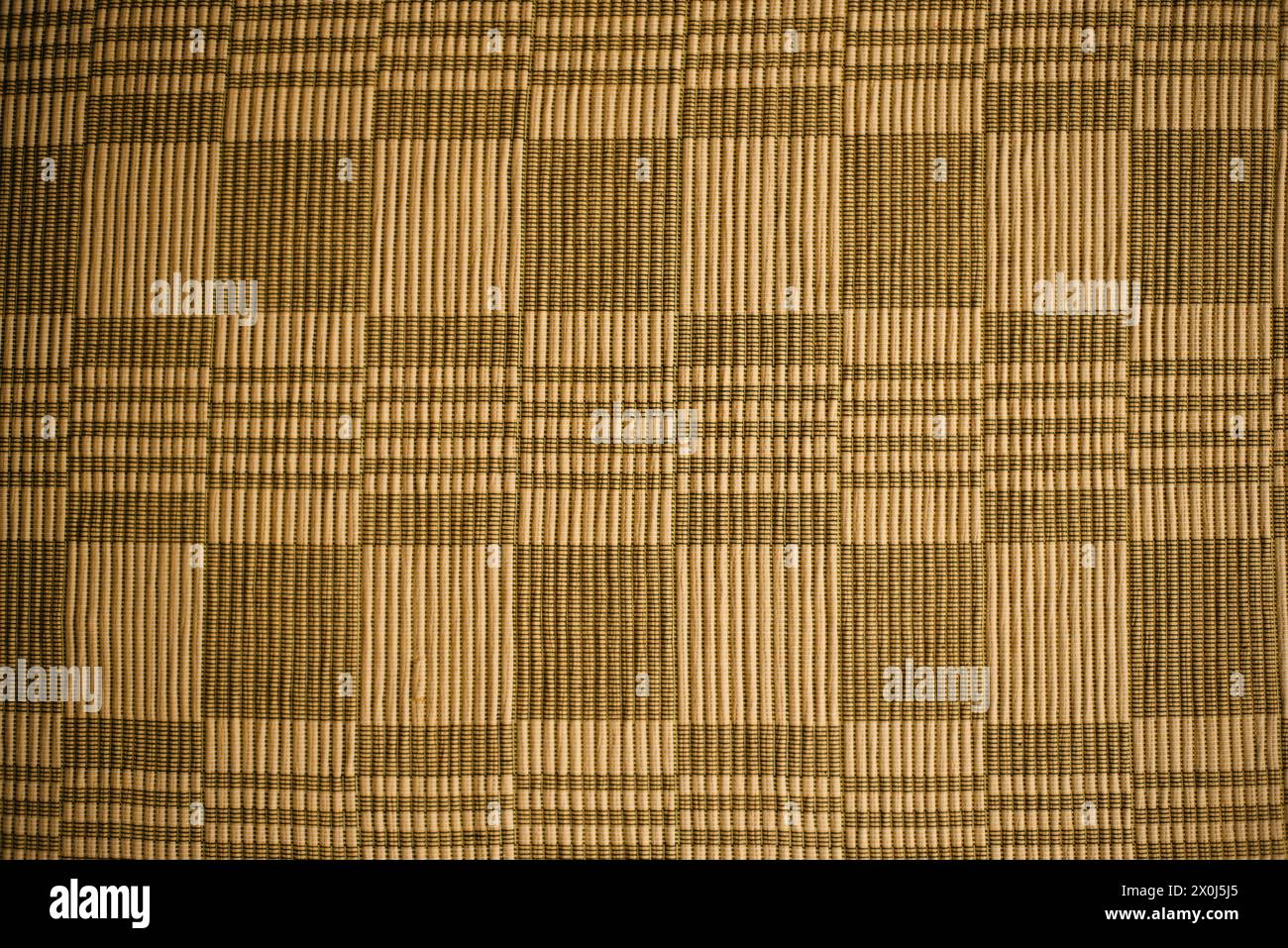 homespun yellow fabric with squares, texture Stock Photo