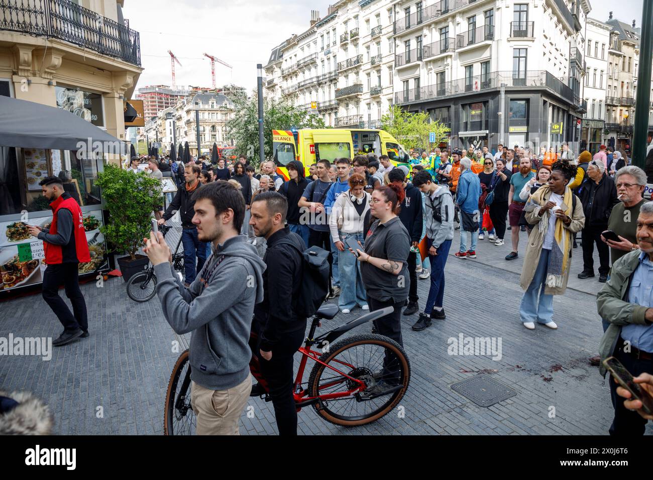 Brussels, Belgium. 12th Apr, 2024. Police have established a security perimeter in the city center of Brussels on Friday 12 April 2024, at the Place Saint-Gery - Sint-Goriksplein in the Quartier Dansaert - Dansaertwijk. According to the first information an armed person has entrenched himself in an apartment building. BELGA PHOTO HATIM KAGHAT Credit: Belga News Agency/Alamy Live News Stock Photo