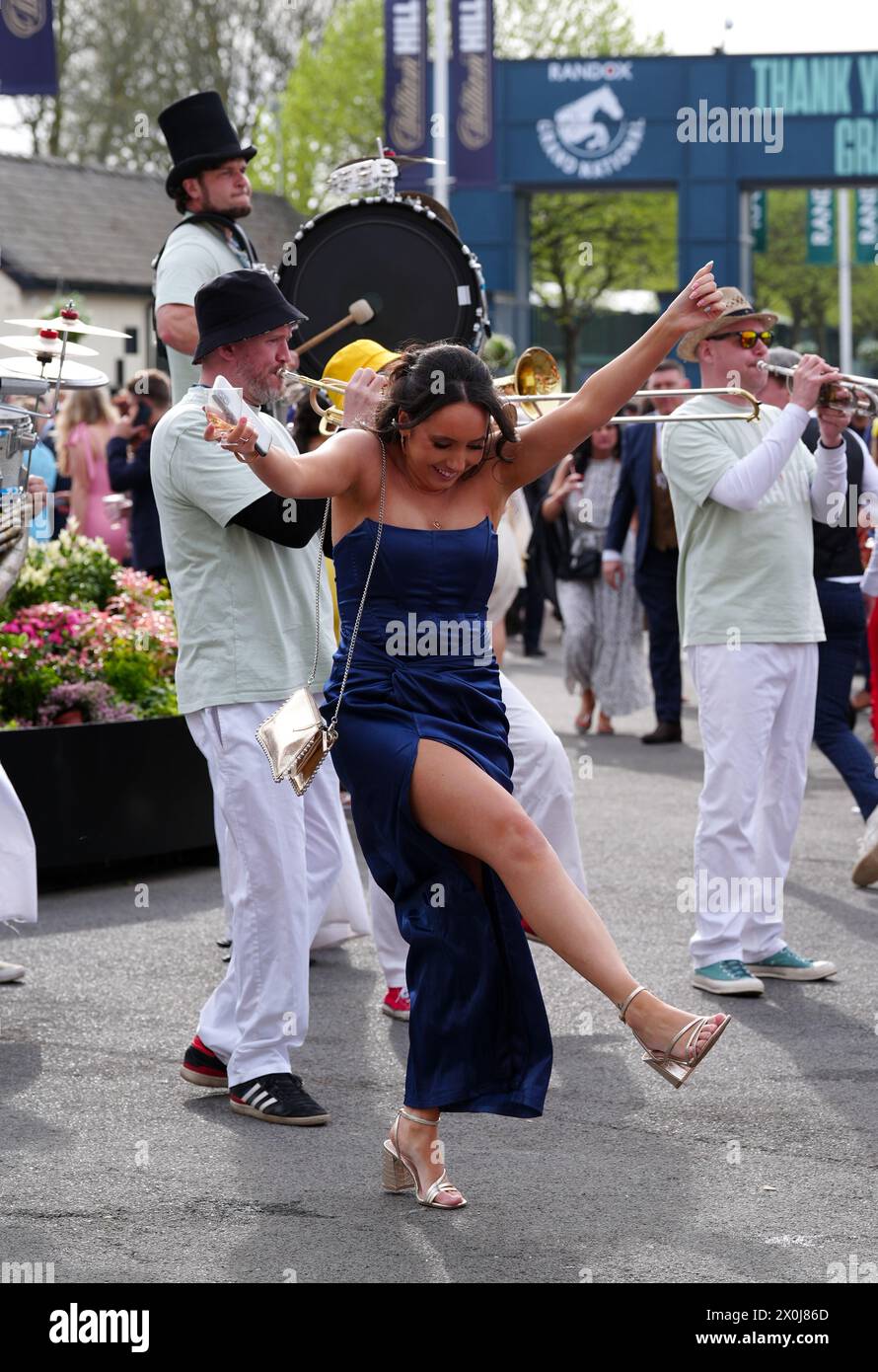 Randox Races Racegoers dancing on day two of the 2024 Randox Grand National Festival ...