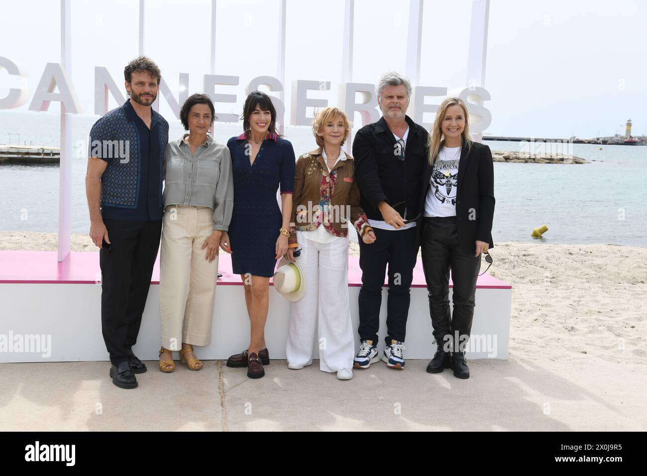 CANNES, FRANCE - APRIL 07: (L-R) Catherine Marchal, Arnaud Binard, Nolwenn Leroy and Marie-Anne Chazel attends the 'Brocéliande' Photocall during the Stock Photo