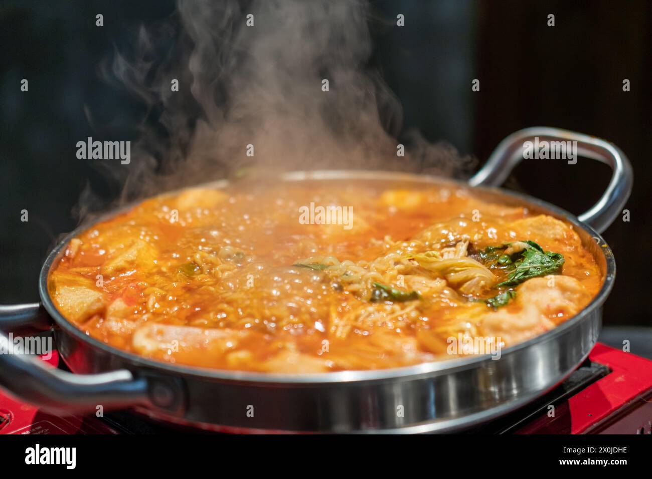 Korean Hot Pot Ramyeon And Tteokbokki In Kimchi Soup With Vegetable