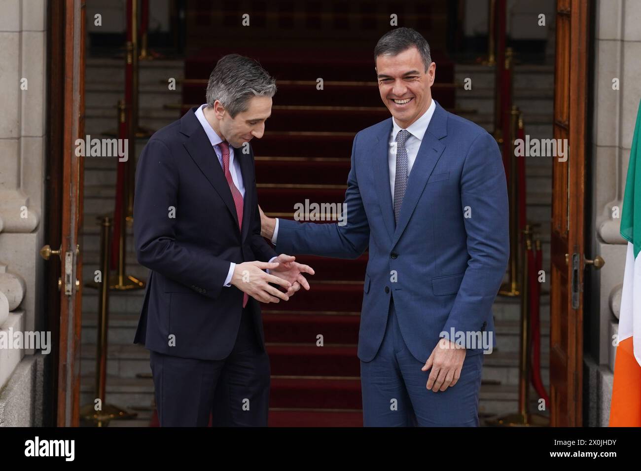 Taoiseach Simon Harris (left) welcomes Spanish Prime Minister Pedro Sanchez to the Government Buildings, Dublin. Picture date: Friday April 12, 2024. Stock Photo