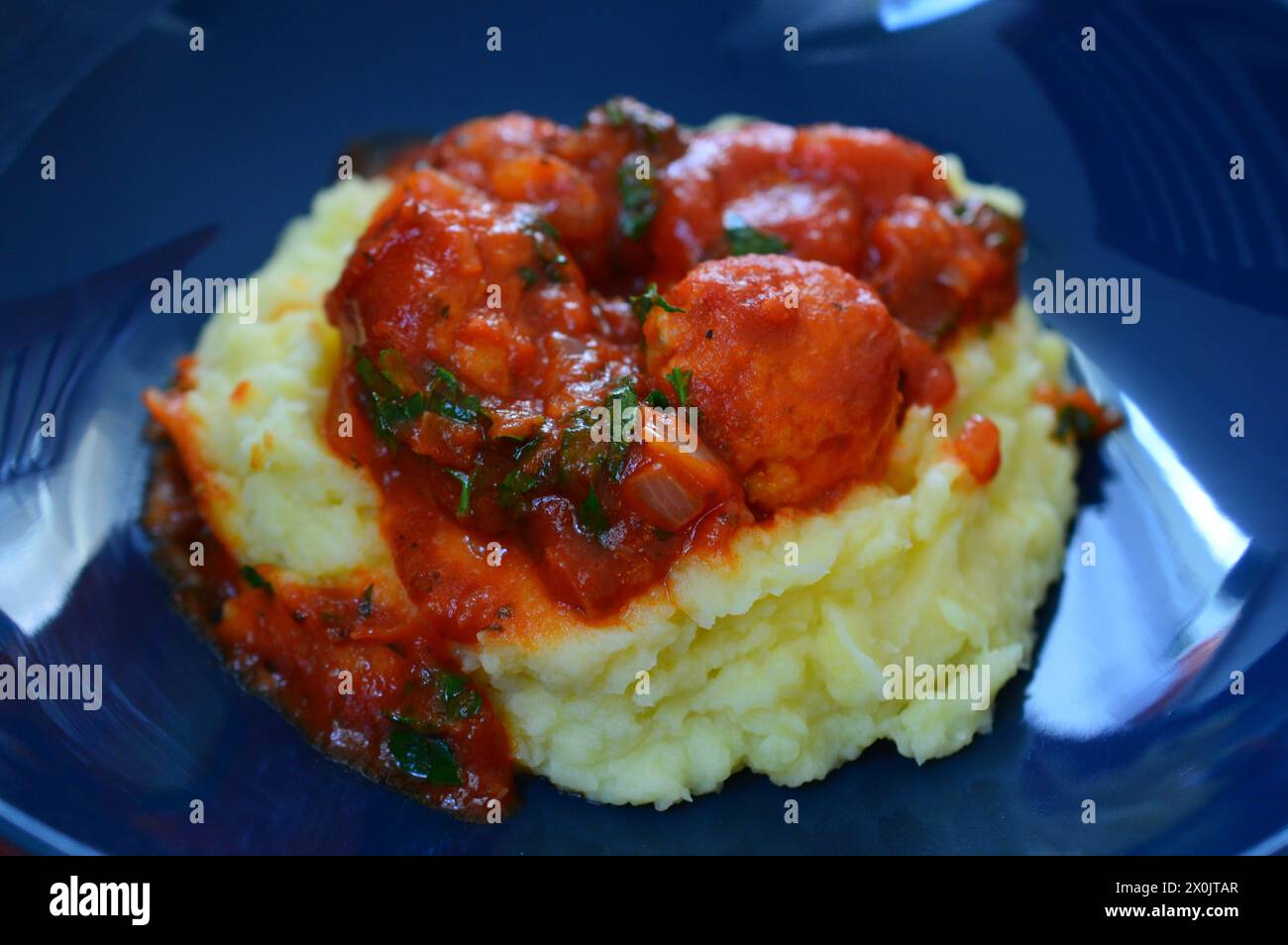 Turkey Meatballs in tomato sauce with mashed potatoes Stock Photo