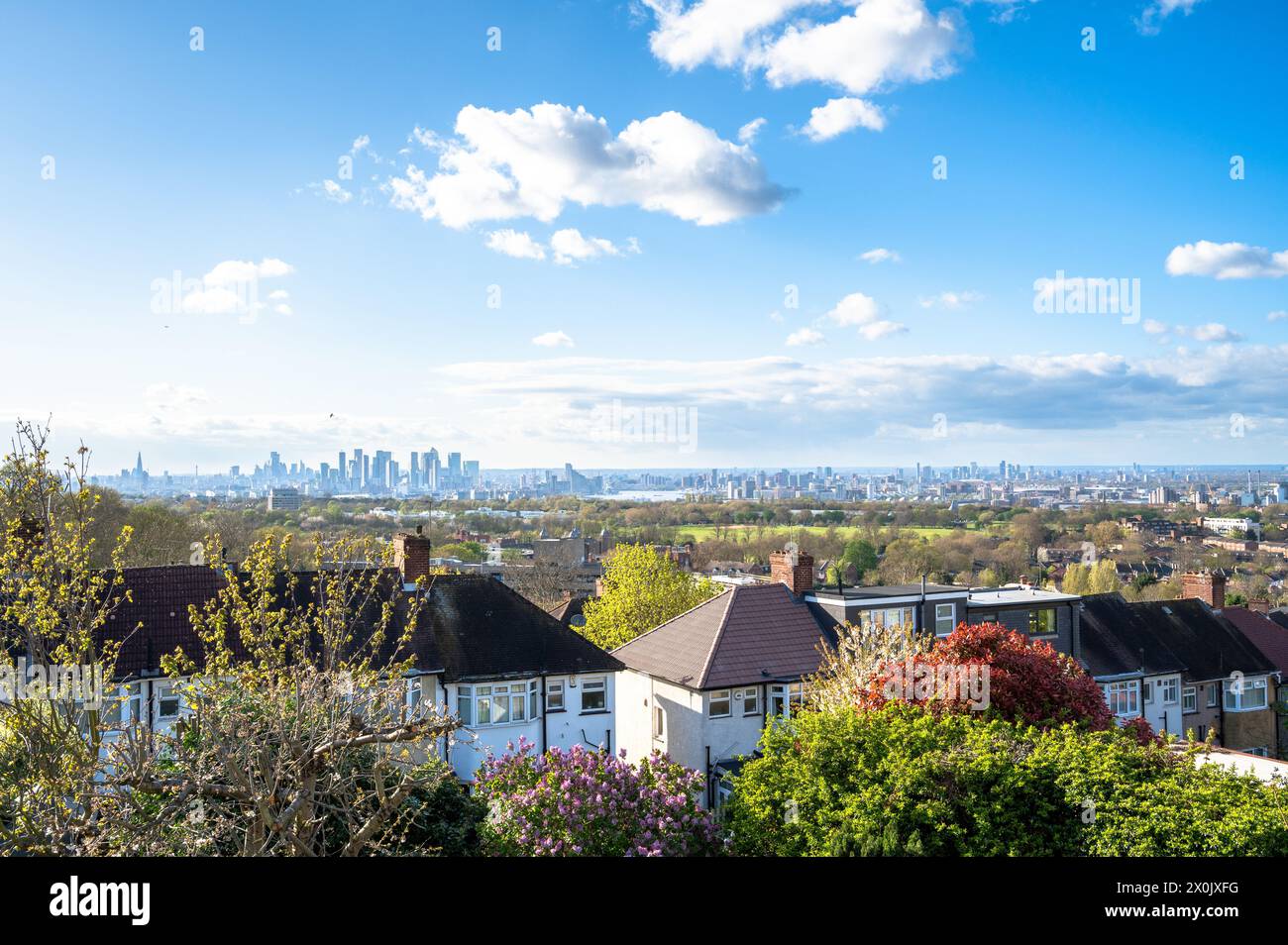Housing in Greenwich Borough with distant views of Woolwich, Woolwich Common and the Canary Wharf skyline, London Stock Photo